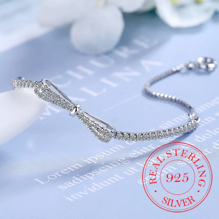 Versatile women's silver tennis bracelet, dazzling zirconia stones make it perfect for any elegant occasion.