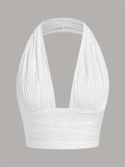 Women's deep V-neck halter top with open back. Slim fit, solid color sleeveless crop top for summer fashion.