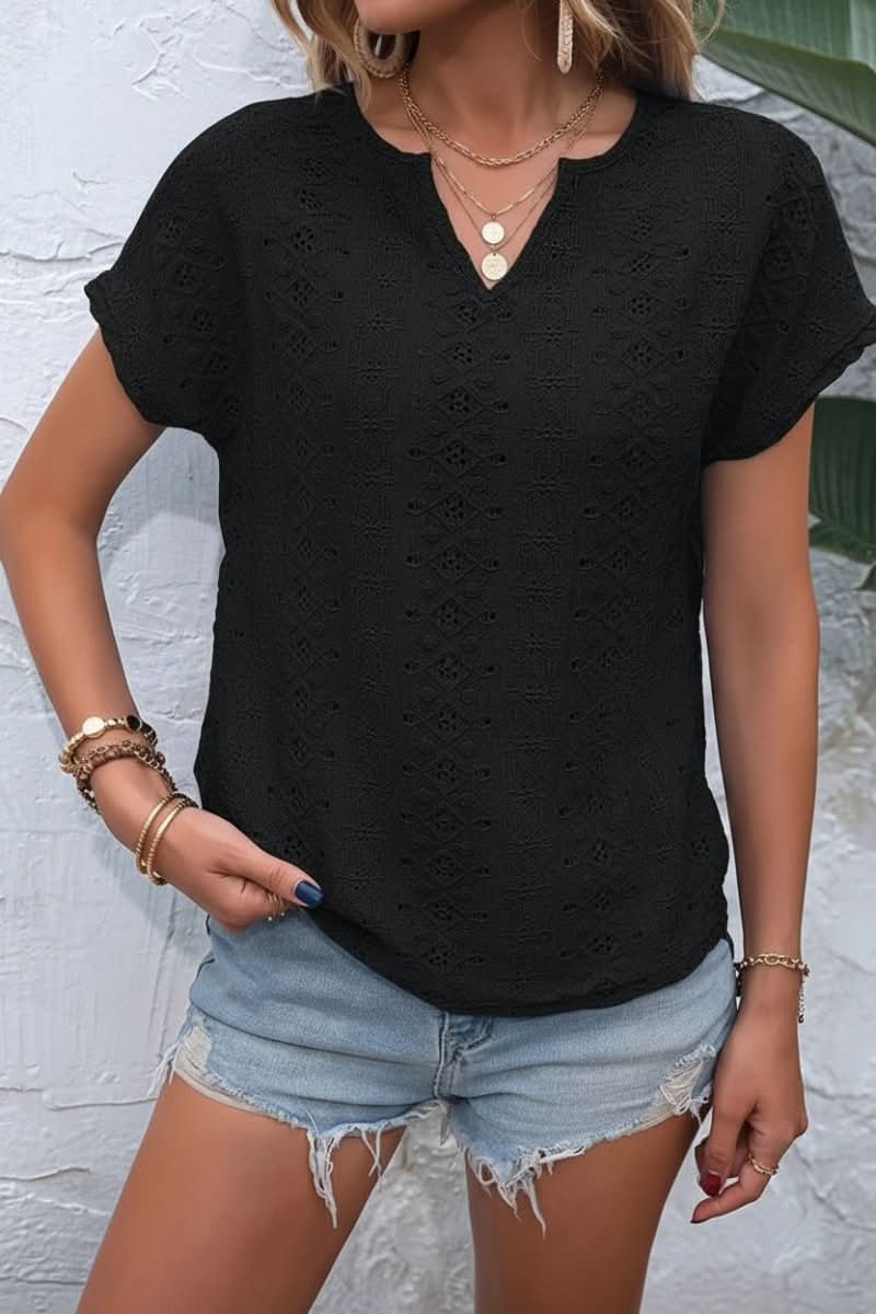 Casual women's t-shirt with eyelet details, notched neckline, perfect for warm weather fashion.