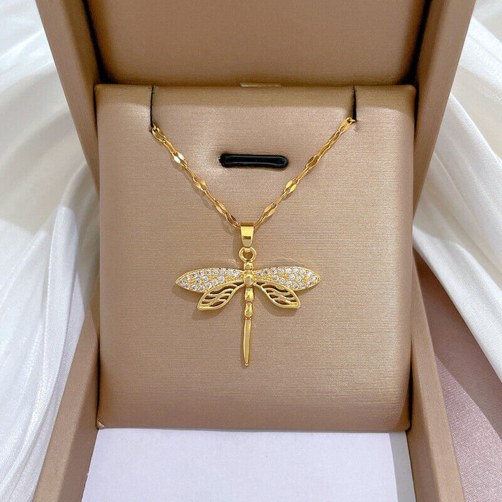 Delicate women's gold plated necklace featuring a beautiful, elegant dragonfly pendant.