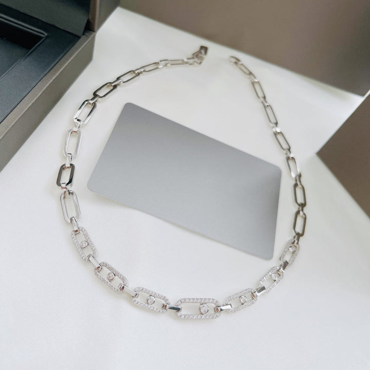 Close-up of Women's Diamond Fusion multi-diamond ring choker, showcasing sparkling details & elegant white gold finish.