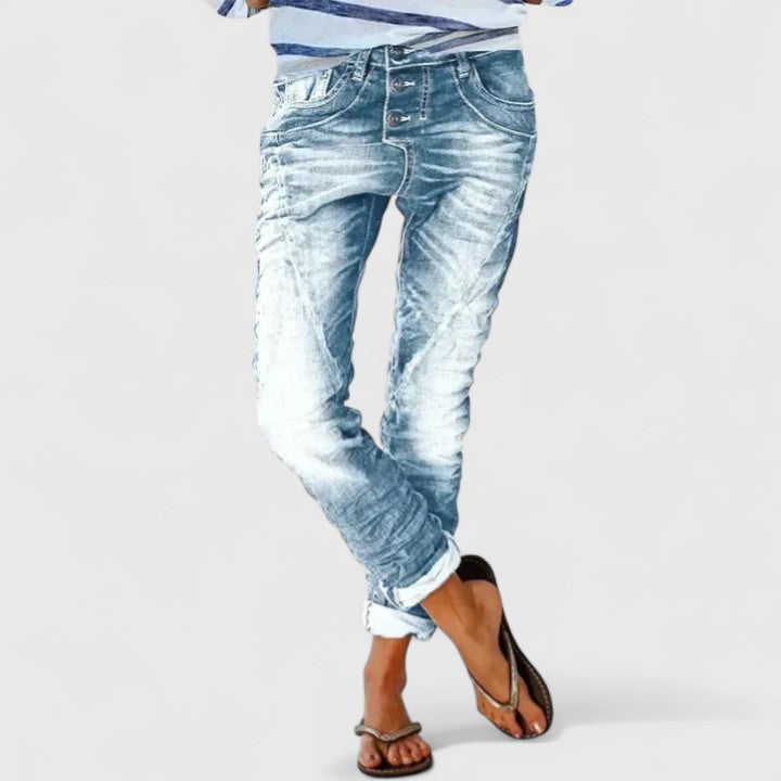 Classic blue distressed wide leg women's jeans, vintage style for everyday casual fashion.