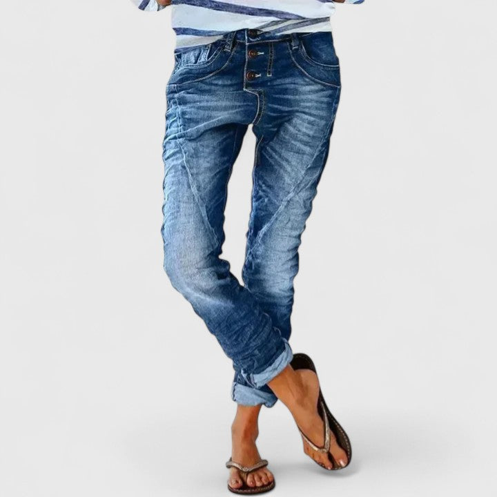 Relaxed fit women's distressed wide leg jeans, perfect for casual fashion, comfortable bottoms.