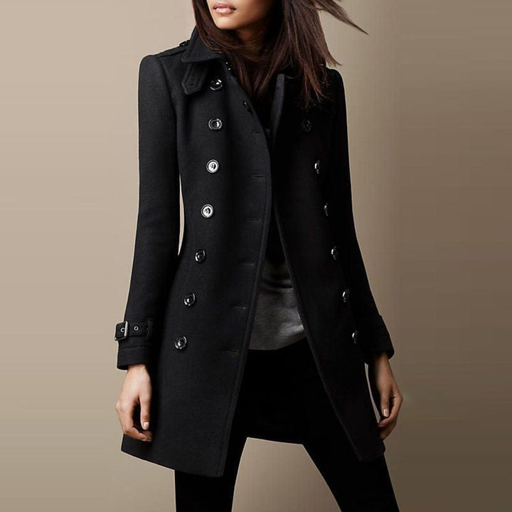 Stylish blue women's double-breasted long tailored coat. Structured collar for sophisticated formal wear.