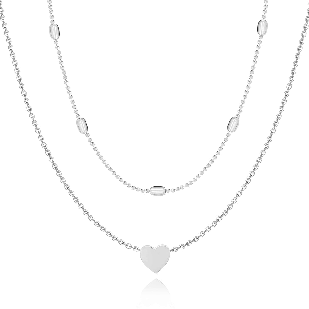 Delicate women's double chain love necklace in sterling silver & gold, perfect romantic gift or elegant accessory.