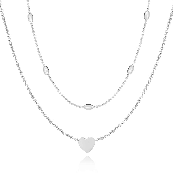 Delicate women's double chain love necklace in sterling silver & gold, perfect romantic gift or elegant accessory.