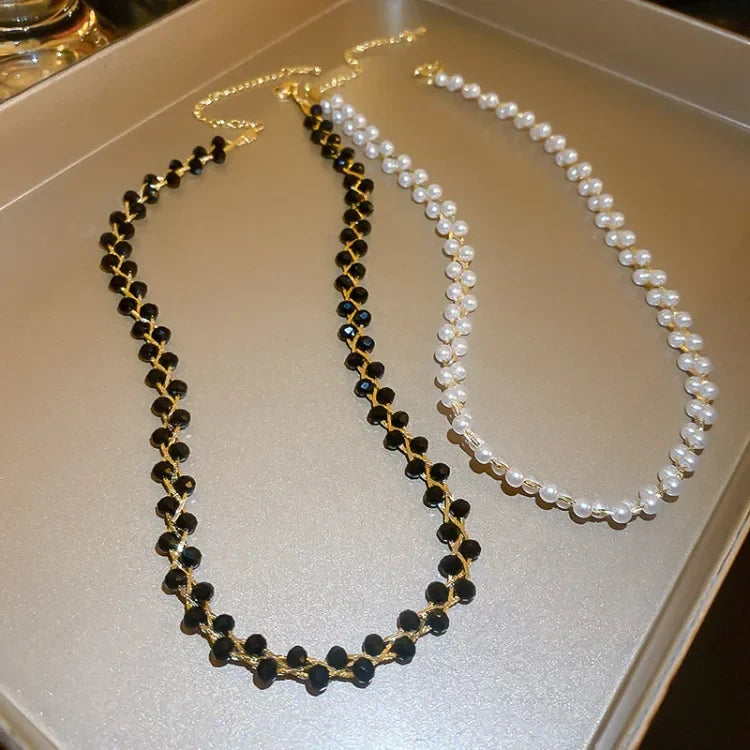 Dainty double crystal and pearl layered necklace for women. Fashionable & timeless jewelry gift accessory.
