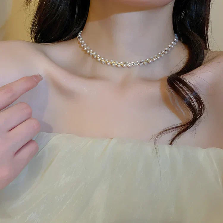 Close-up: Elegant women's double-layered necklace featuring shimmering crystals and lustrous pearls. Jewelry.
