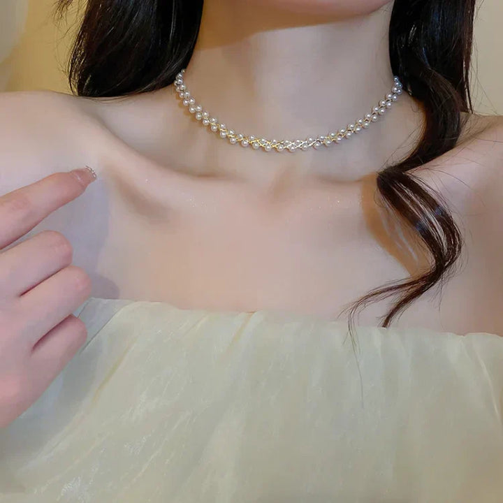 Close-up: Elegant women's double-layered necklace featuring shimmering crystals and lustrous pearls. Jewelry.