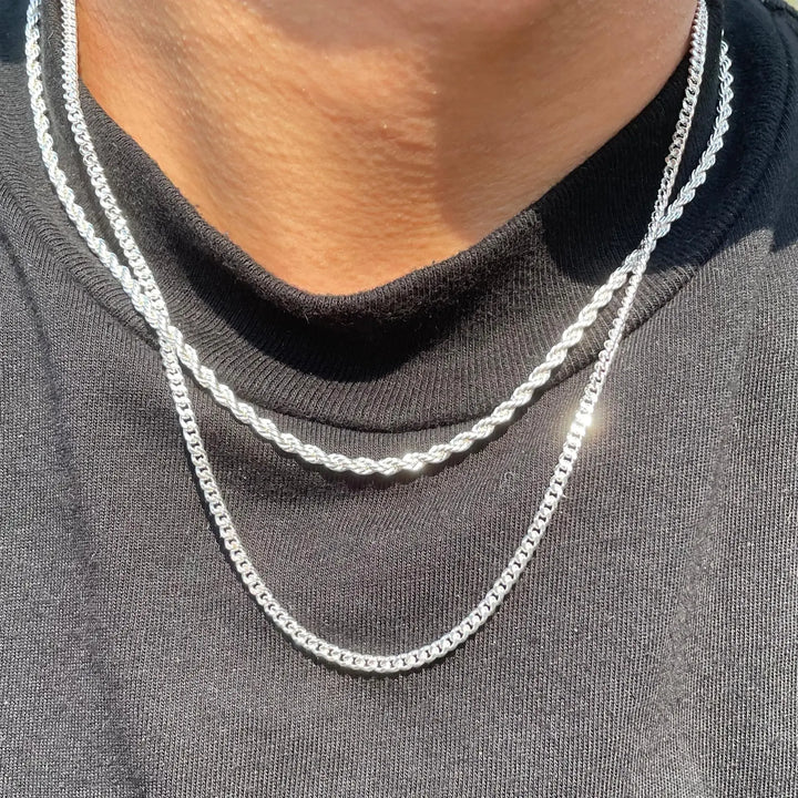 Women's sterling silver double layered necklace. Stylish silver chain jewelry with a curb chain and a rope chain.