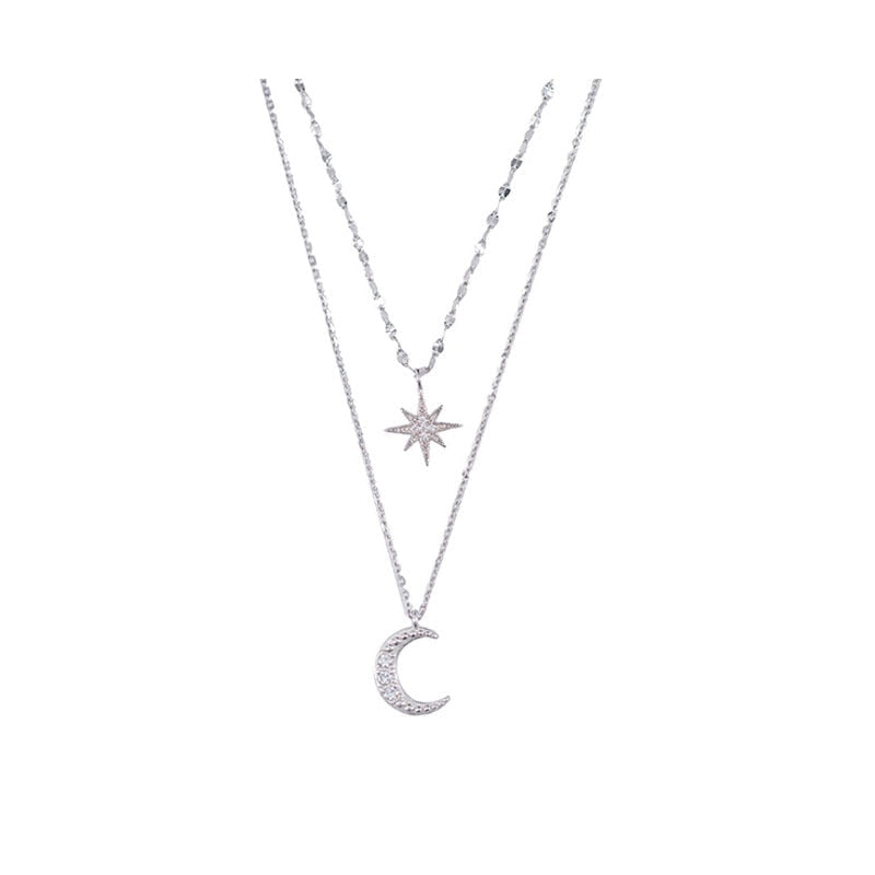 Women's double moon layered sterling silver necklace, a celestial pendant with fine craftsmanship, perfect for gifting.