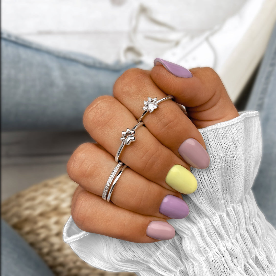 Beautiful women's sterling silver ring with two brilliant zirconia stones. A timeless, elegant, and sparkling piece.