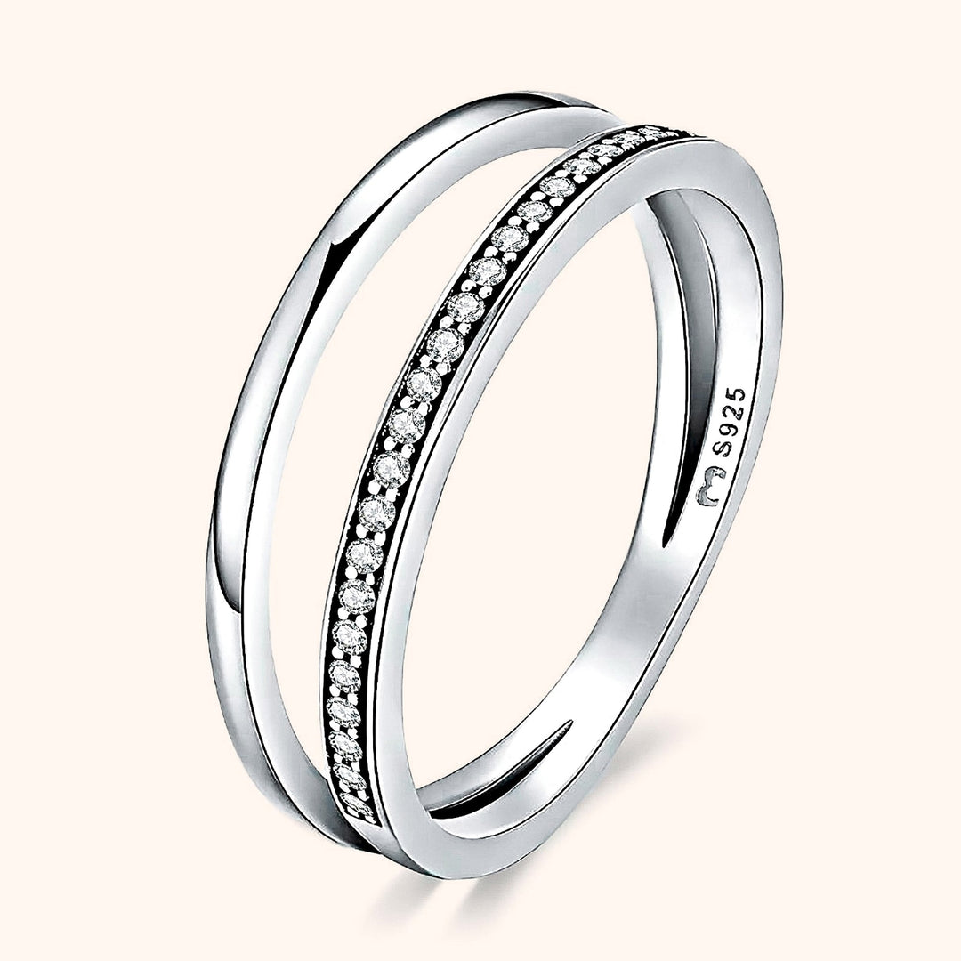 Delicate double zirconia sterling silver ring for women. A shimmering and elegant jewelry piece for any occasion.