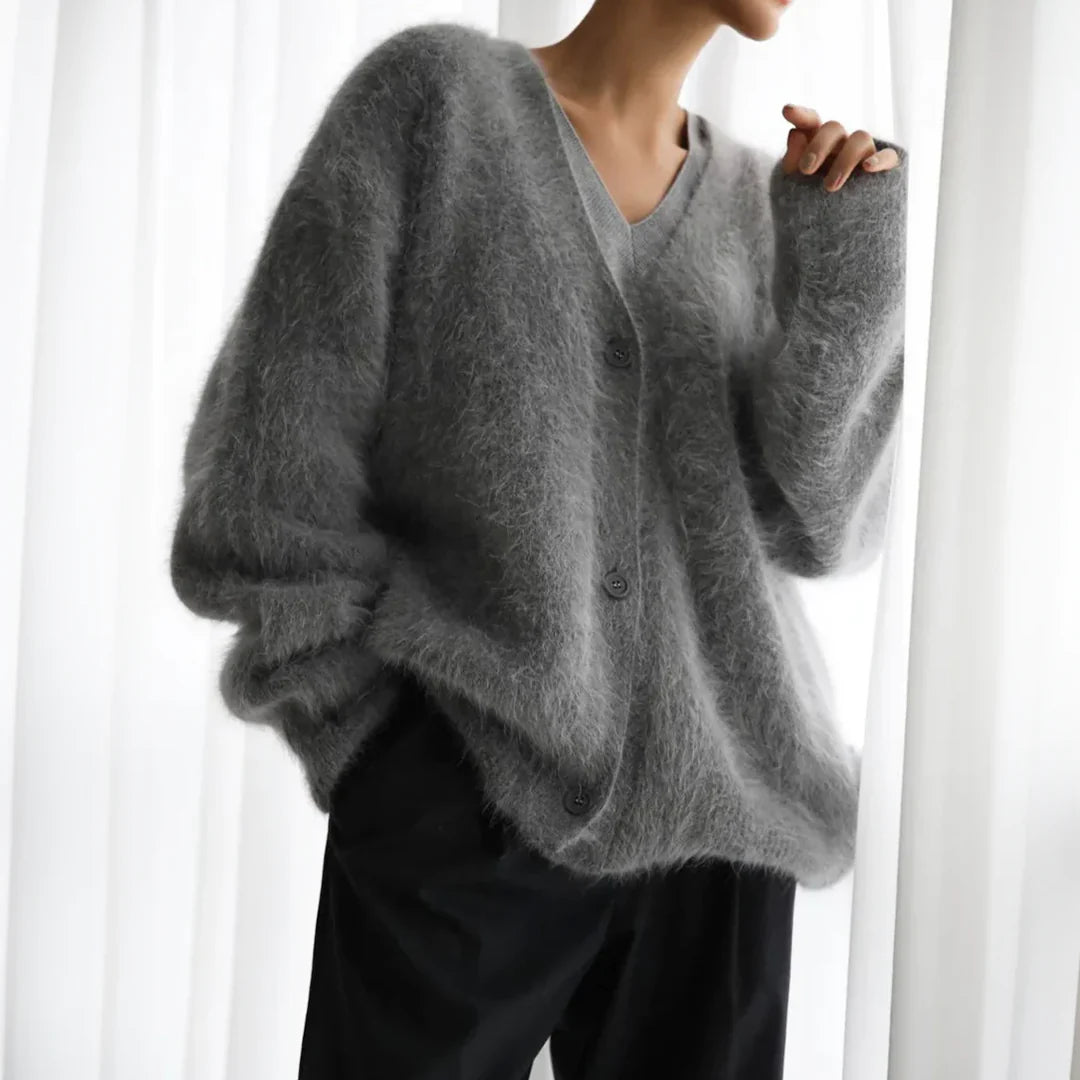 Women's draped open front cardigan in soft fabric, perfect for casual layering & effortless fall style.