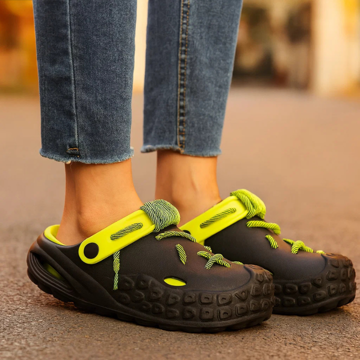 Stylish women's laced slides. Echo Clogs offer customizable comfort & lightweight design.