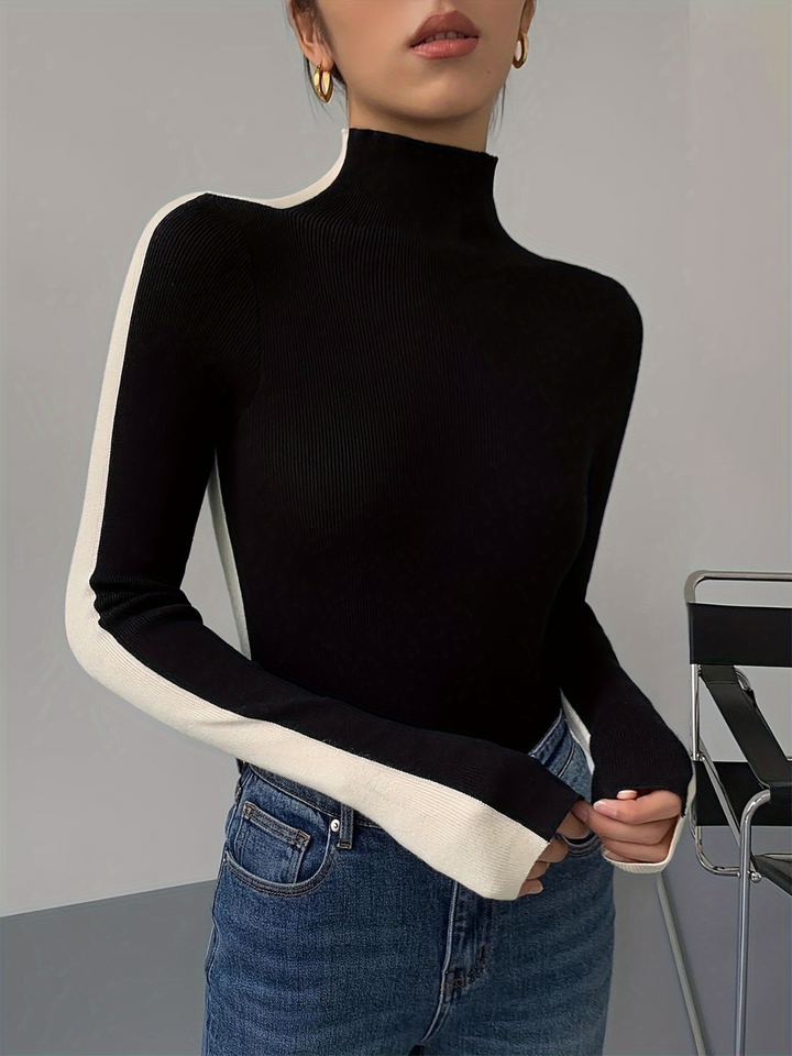 Women's Eclipse long sleeve knit turtleneck with stylish contrast trim. Slim fit, stretchy, perfect for layering.