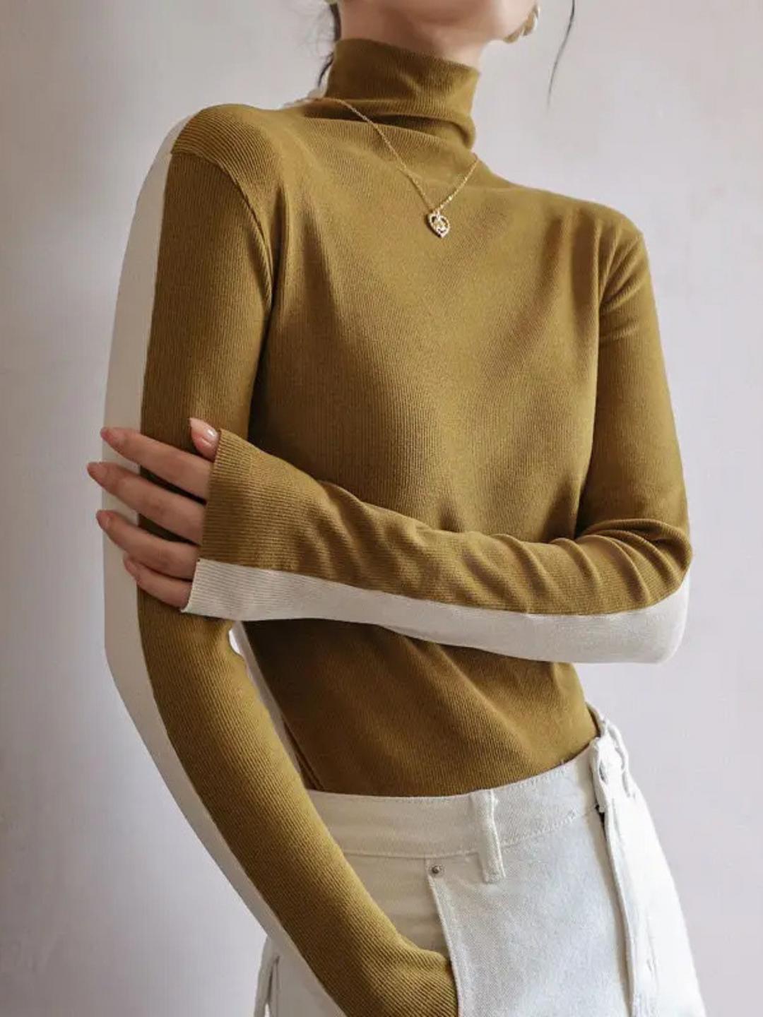 Women's Eclipse knit turtleneck with contrast. Long sleeve, slim fit, stretch, perfect for elegant layering.