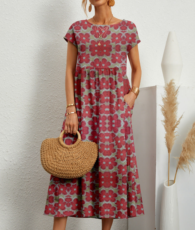 Comfortable, flowy Eden floral midi dress for women with A-line silhouette, short sleeves & practical pockets.