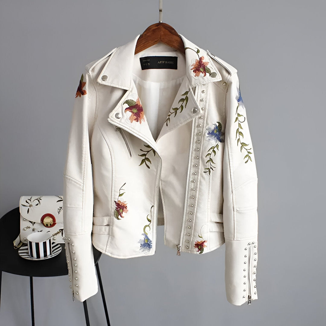 Full view: women's black edgy jacket, floral embroidered, studded, chic style.