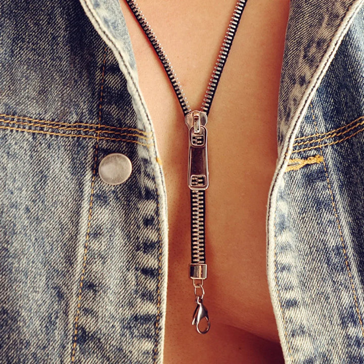 Edgy women's metallic zip chain necklace, a stunning statement jewelry piece for modern fashion.