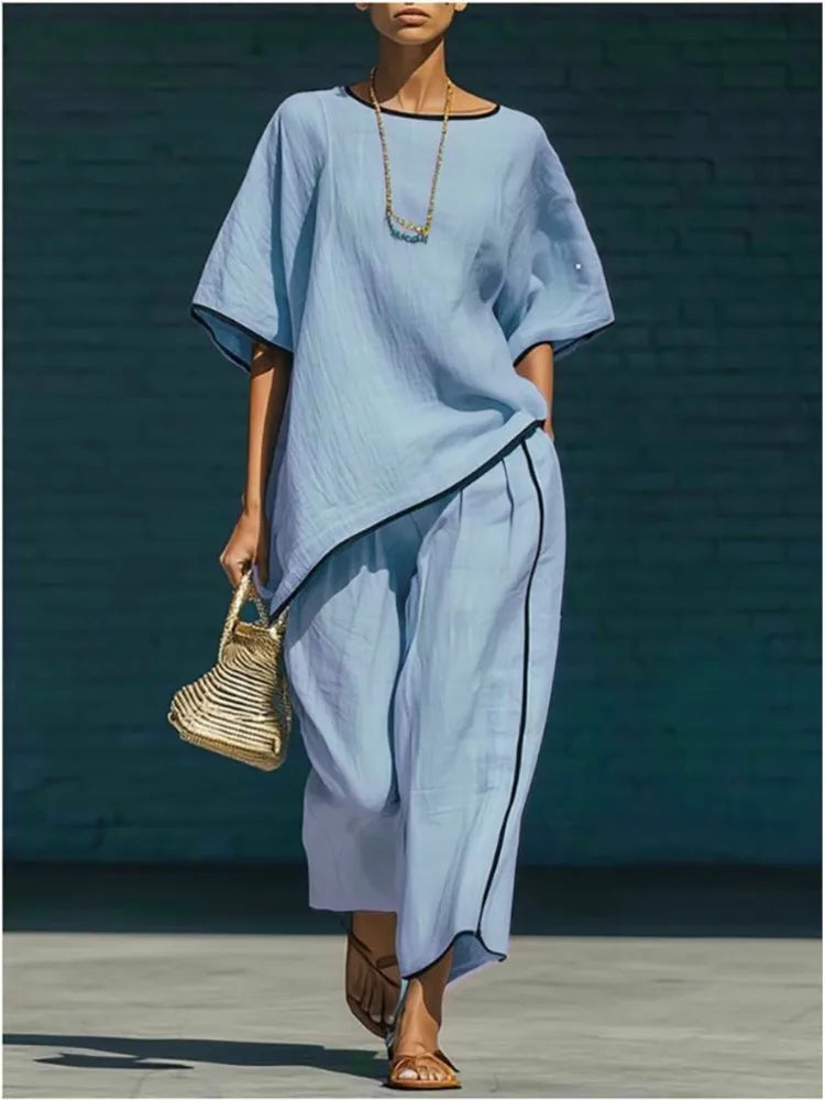 Women's effortless 2-piece cropped pant & top set. Stylish, comfortable, wide-leg design, perfect for casual spring/summer wear.