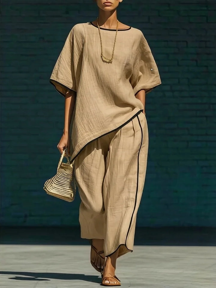 Complete women's two-piece outfit: a cropped top and wide-leg pant set. Effortless, comfortable, and stylish for summer.