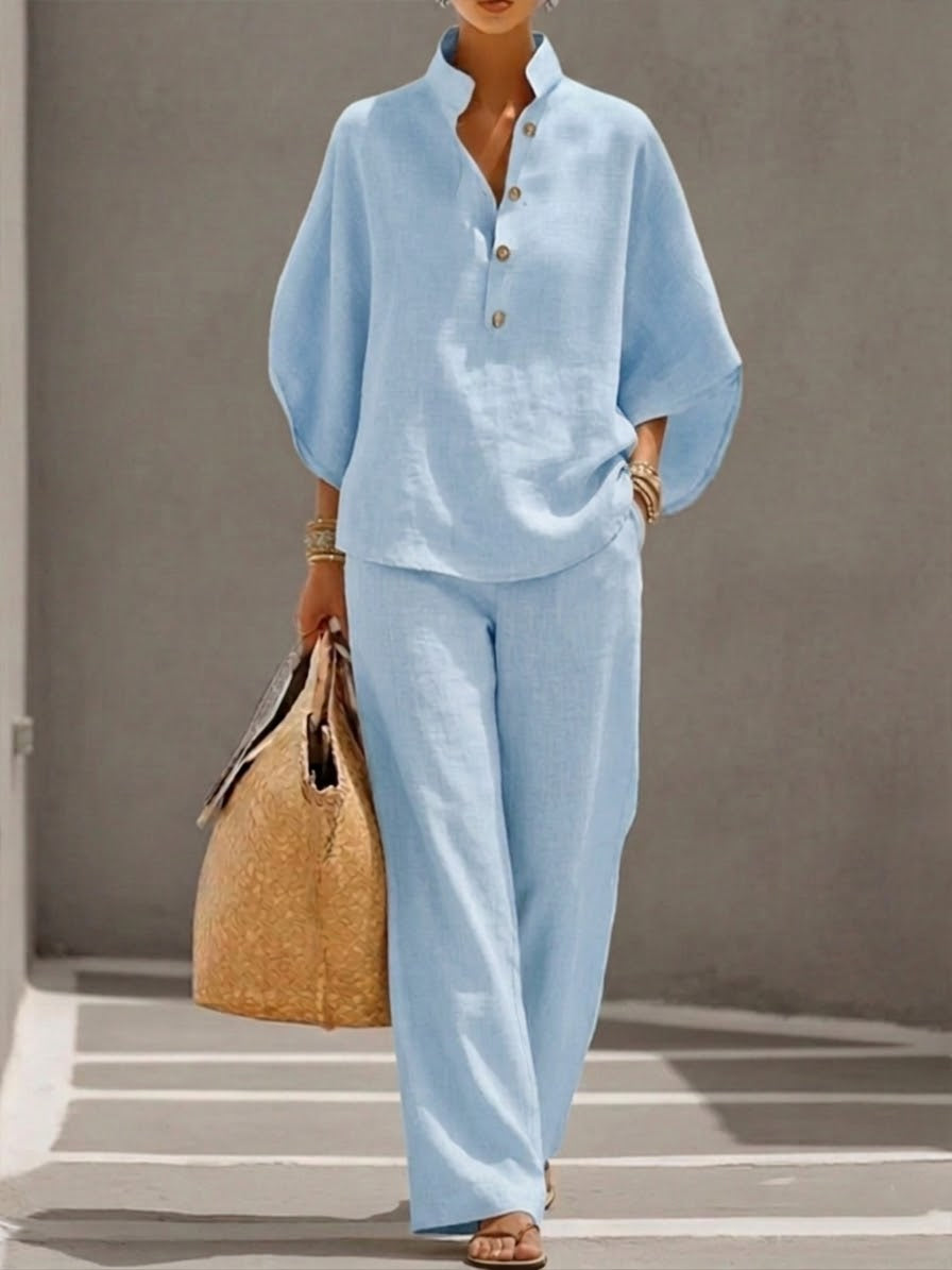 Comfortable women's batwing blouse & wide leg trousers set, perfect for versatile spring/summer outfits.
