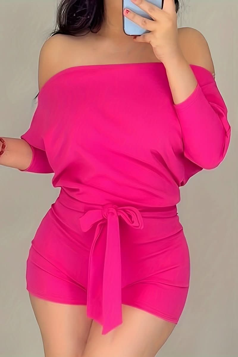 Women's effortless batwing jumpsuit shorts. Stylish short romper, perfect for summer casual wear & comfort.