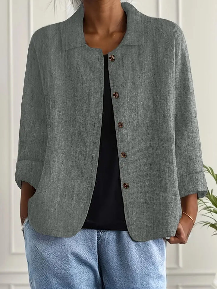 Women's casual button-front top in a relaxed fit, great for everyday comfort and style.