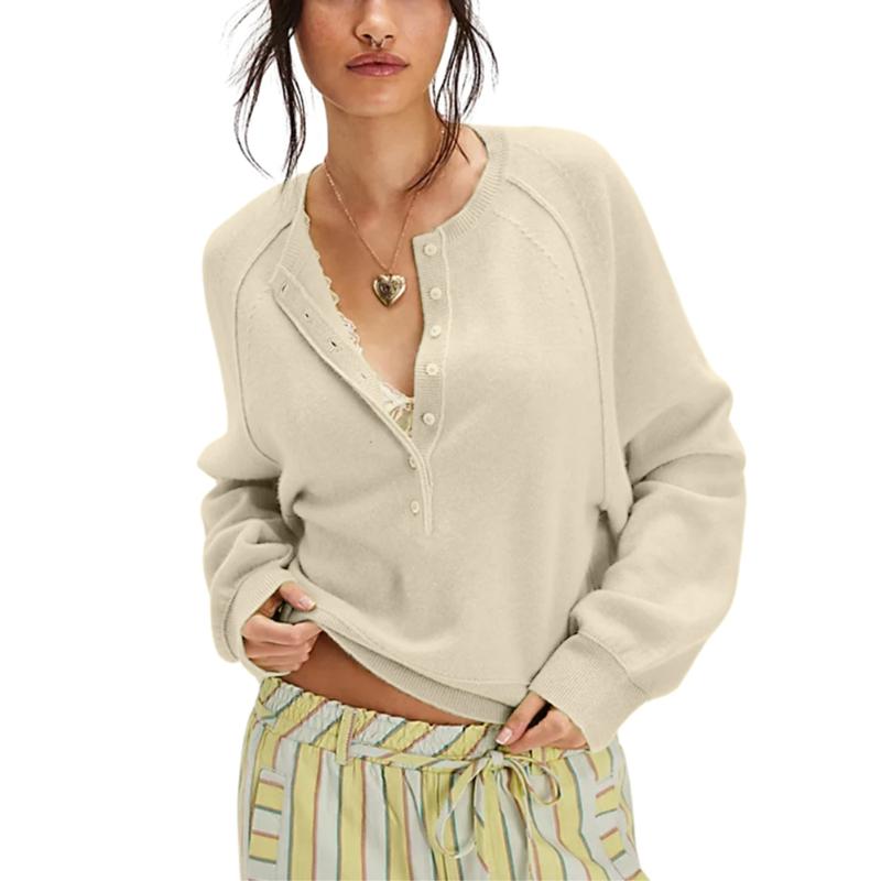 Chic women's knit pullover sweater with henley button-front, long sleeve & relaxed fit.