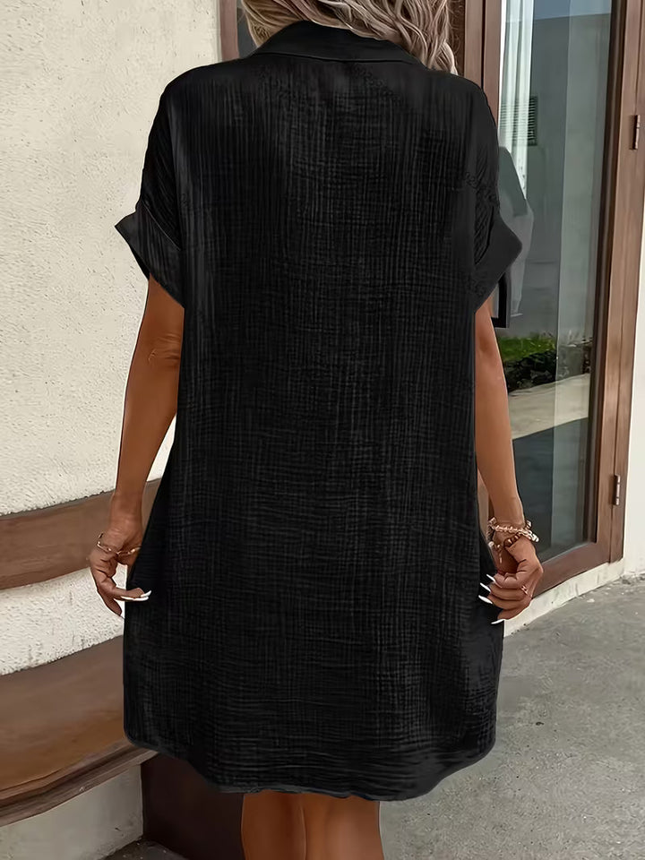 Effortless women's button-front shirtdress. Easy fit, pockets, versatile for casual summer & chic style.