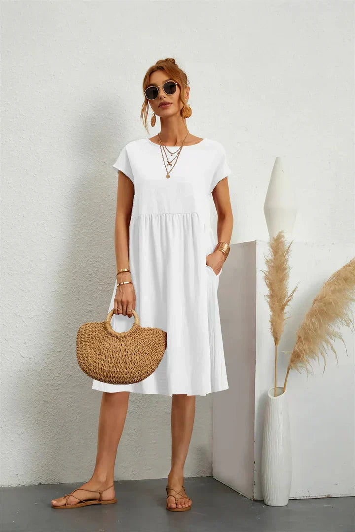 Everyday wear women's knee-length dress, relaxed fit and stylish design with pockets.