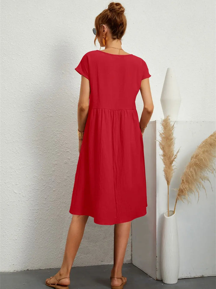 Effortless women's casual pocket dress, relaxed fit for breathable and stylish summer comfort.