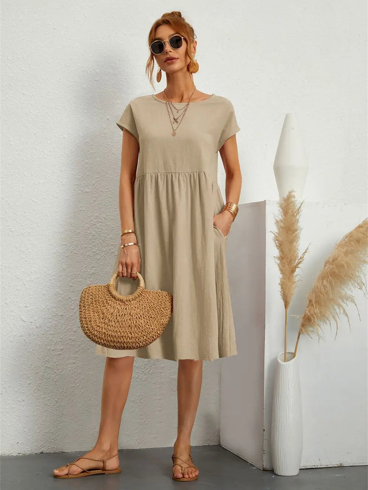 Simple women's relaxed fit casual dress, comfortable and stylish for easy everyday wear.