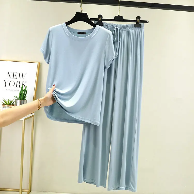 Versatile women's loungewear set for everyday chic, relaxing at home or running errands in comfort & style.