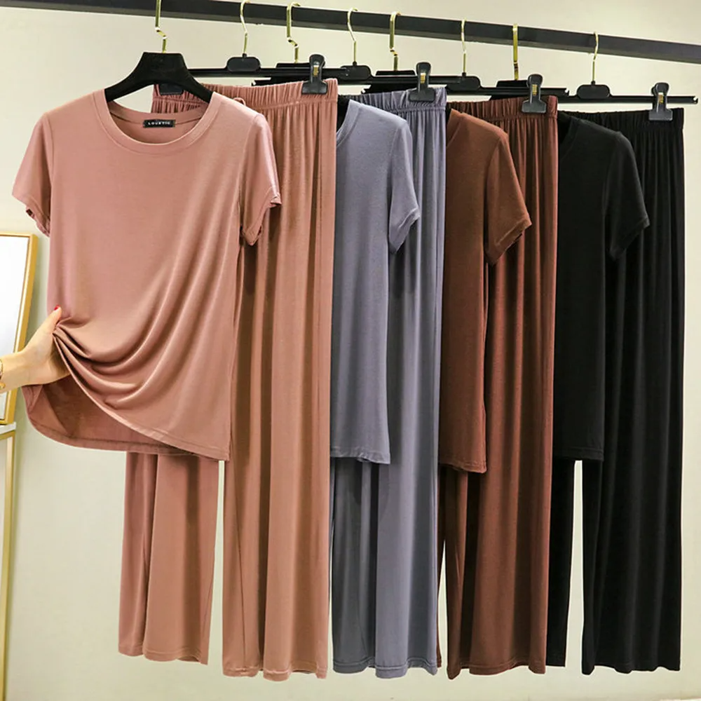 Model in a comfortable women's lounge set, showcasing relaxed fit and everyday chic style for home or casual.
