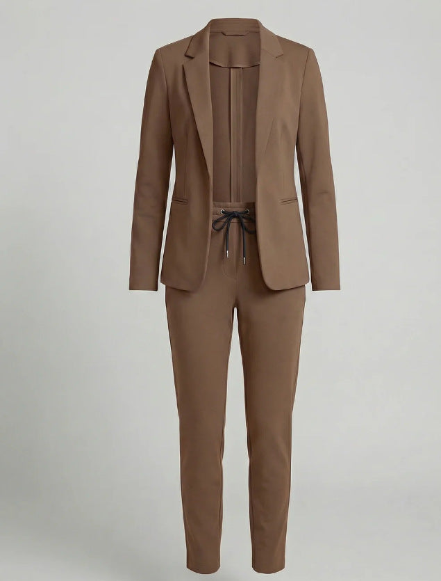 Chic women's blazer from a two-piece suit set, offering modern professional wear & comfortable elegance.