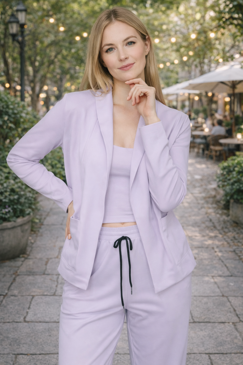 Modern women's attire: an effortless chic two-piece suit set featuring a fashionable blazer & comfortable pants.