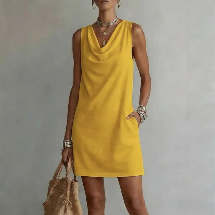 Chic women's draped neck mini dress with pockets, a comfortable sleeveless design for casual summer days.