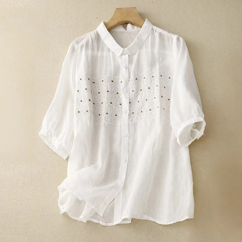 Women's effortless embroidered button-up shirt, casual long sleeve top with delicate stitching.