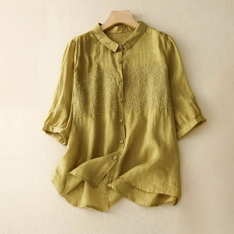 Casual women's button-up shirt with intricate embroidery, a relaxed long-sleeve top perfect for summer.
