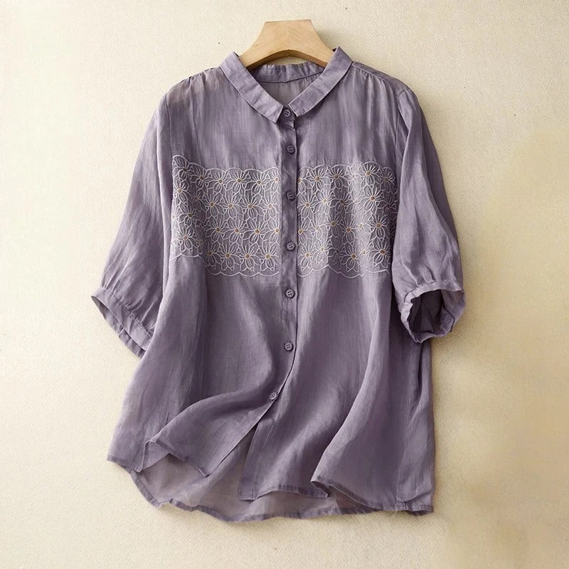 Relaxed long-sleeve women's shirt, featuring beautiful embroidery and a classic button-up design for comfort.