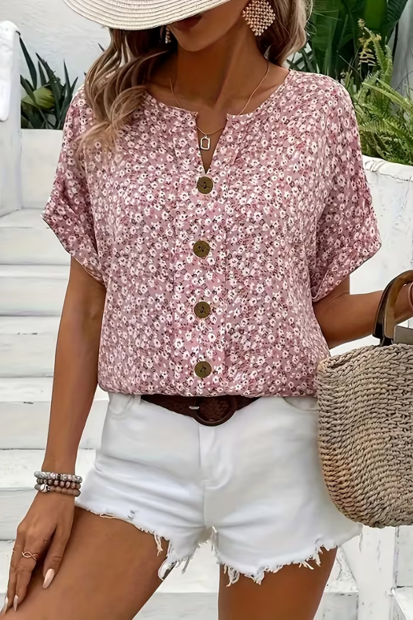 Women's effortless floral blouse with short sleeves, relaxed fit for summer comfort. Ideal for casual wear.