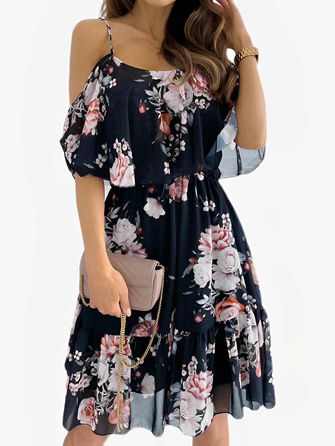 Comfortable and romantic floral mini dress with cold shoulder cutouts and a flowy fit.