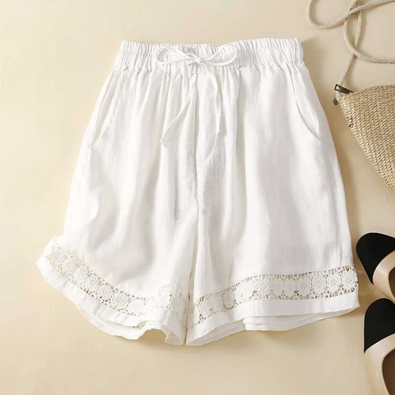 Women's effortless floral shorts with elastic waist, perfect for comfortable summer wear & everyday fashion.