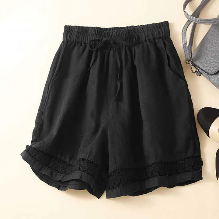 Relaxed fit women's floral shorts with elastic waist, ideal for vacation, warm weather, and casual summer style.