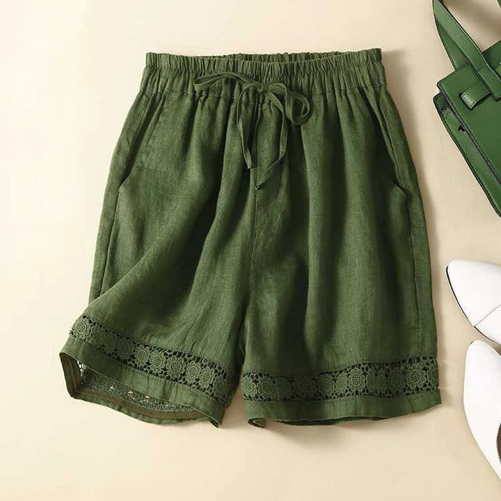 Stylish women's floral shorts with an elastic waist, offering effortless comfort and a relaxed fit for summer fashion.