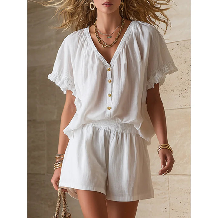 Stylish women's coordinate set: flutter sleeve top and shorts. An effortless two-piece casual outfit for warm days.
