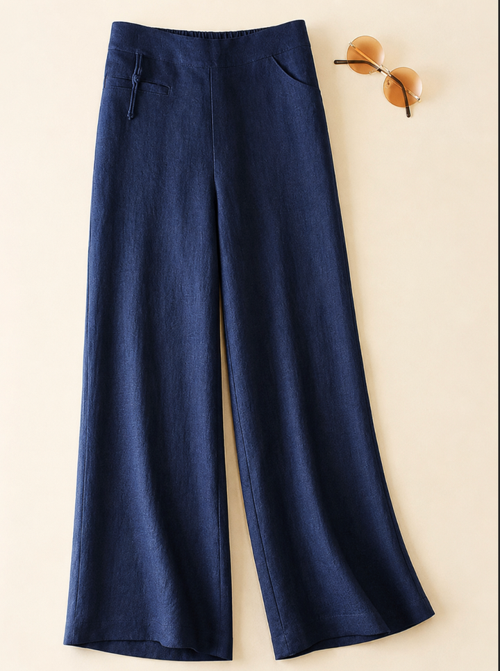 Stylish women's high waist wide leg pants in black, featuring a comfortable relaxed fit, elastic waist, and practical pockets.