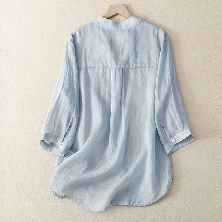 Breezy women's lightweight button-up shirt, a versatile long sleeve blouse for effortless summer style and comfort wear.